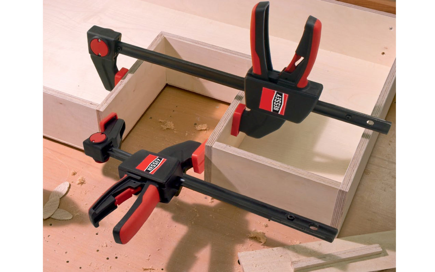 Bessey 6" One-Handed Clamp ~ EZS 15-8. 6" max opening - 3-1/2" throat depth. Intelligent release mechanism on clamp, the upper section can quickly convert from clamping to spreading without tools. Soft pads. 445 lbs. clamping force. Well balanced, ergonomic design for easy, single-handed use. 788502200219