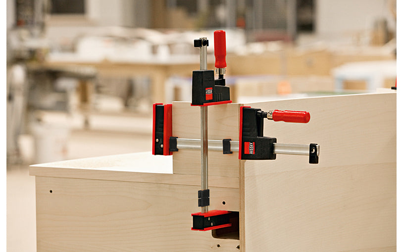 Bessey Parallel K-Body REVO JR Bar Clamps have 90 degree jaws that make cabinet work, frame ups, drawers & any other right-angle glue-up a much easier task. 36" max opening - 3-1/4" throat depth - Model KRJR-36 - Bessey K Body REVO JR - The large surface areas distribute high clamping force evenly - Wooden Handles - 091162001431