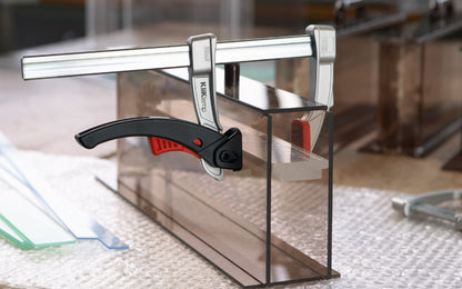 Bessey 4" "KliKlamp" Light Duty Lever Clamp KLI3.004 creates up to 260 lbs. of clamping force. Positive locking ratchet action. Made of sturdy magnesium which makes it lightweight & strong. Fixed arm with v-grooves holds round & angular components firmly in place. 4" clamping capacity - 3" throat depth. Made in Germany