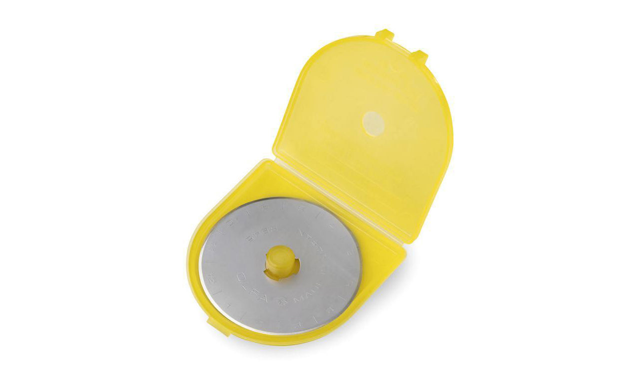 Olfa's most popular rotary blade combines the strength of high-quality tungsten steel with expert honing for a blade that cuts up to eight layers of cotton with ease. Paper, fabric, leather & more, this blade can tackle them all - crafting precise edges & clean cuts. 091511500424. Olfa Model RB45-1. Made in Japan