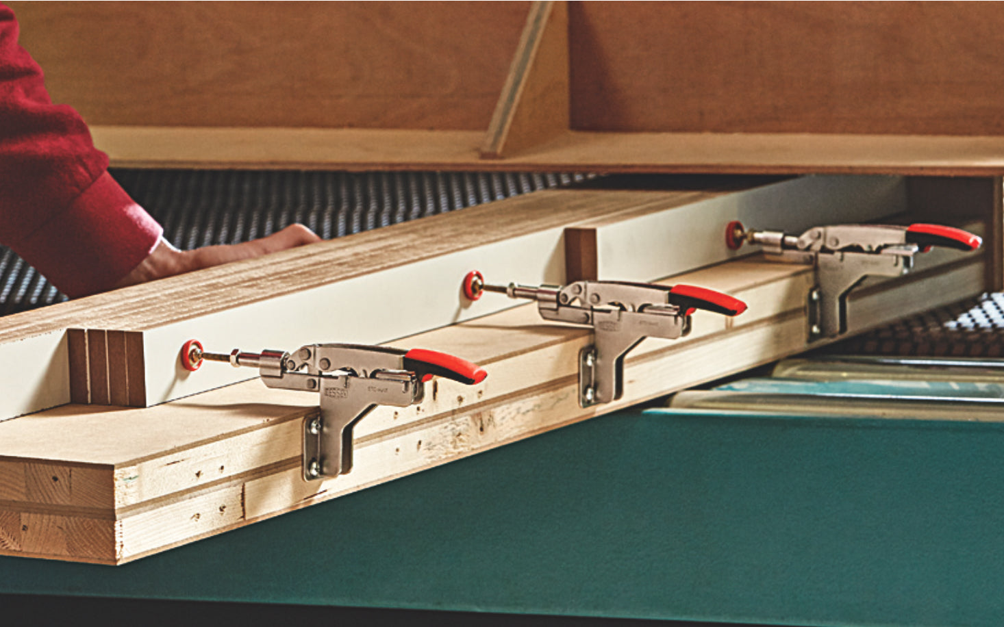 Bessey Auto-Adjust Horizontal Toggle Clamp - STC-IHA15. Auto-adjustment -  Self adjusts to variations in workpiece while maintaining clamping force - 3/8" clamping capacity. Adjustable clamping force based on the adjusting screw in the joint (Range of 25 to 250 lbs.). Holding capacity up to 450 lbs (nominal)