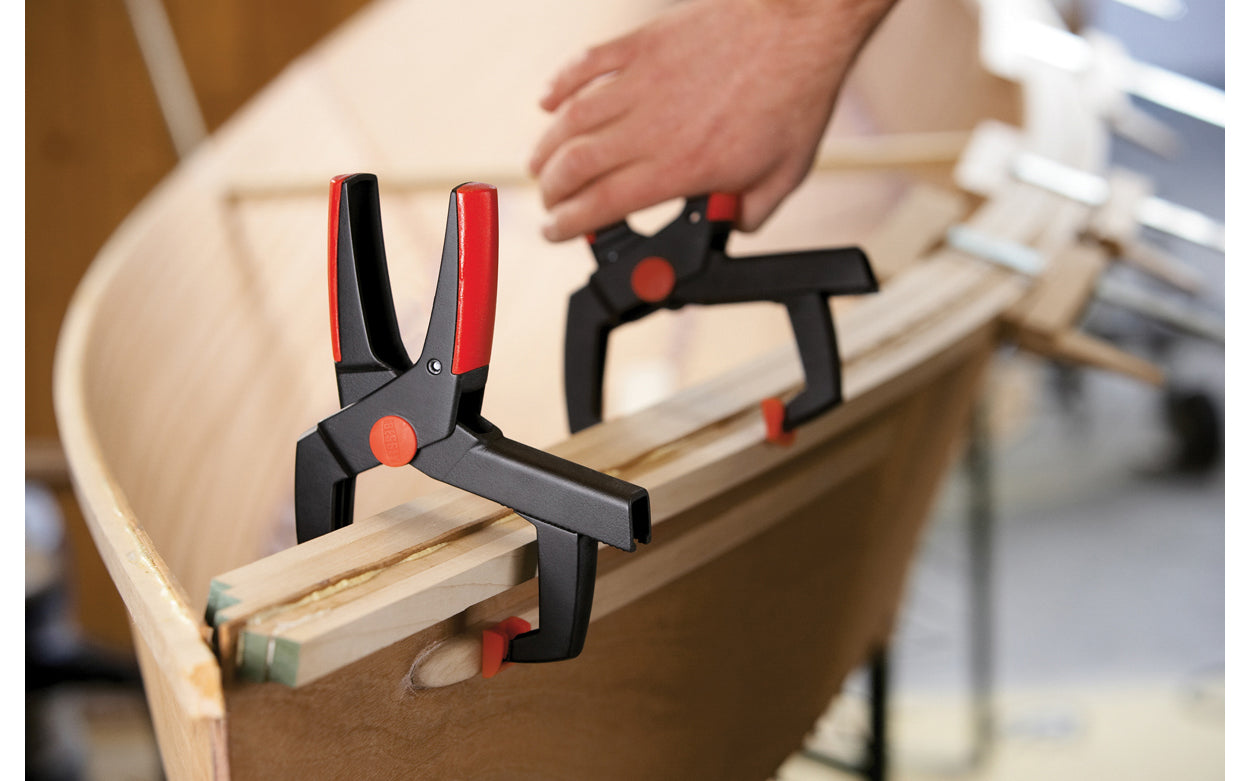 Bessey Clamps Model No. XV5-100 - These variable spring clamps from Bessey can clamp on items and have 4" max opening. 2" depth reach. They have soft-touch swivel pads that prevent marring of soft work & the handles remain in constant easy-to-grip position at all openings. Soft & non-slip two component ergonomic handle