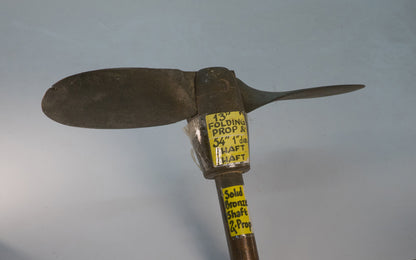 Solid Bronze 13" Folding Prop & 54" Long 1" Diameter Shaft. Heavy Solid Bronze - 18 lbs. 54" long shaft. Blades fold down.