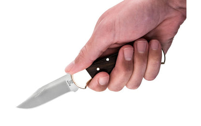 Buck Knives 112 Folding Ranger Knife & Leather Sheath - Made in Idaho - Made in USA ~ Model No. 0112BRS ~ Very popular & classic model ~ Genuine ebony handle with solid brass bolsters ~ 3" blade length - Includes a genuine black leather sheath - Blade made of 420HC Stainless Steel - Satin finish  