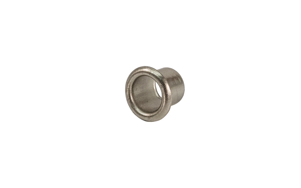 A metal shelf support grommet with diameter for 9/32" holes designed for 1/4" pin diameters. Sleeve is Anochrome finish. Made by KV - Model No. 325