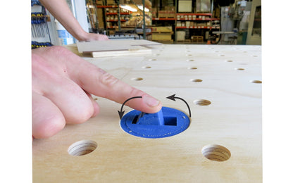 Gives great functionality to your workbench when dogs are needed - 2-1/2" diameter - Model BLUE DOG SINGLE - use a 2-1/2" hole saw to drill out a hole, sand the top edge, & press the Blue Dog down into the hole until flush - height adjustment for any material thickness & the turntable feature allows flexibility - 663807025005
