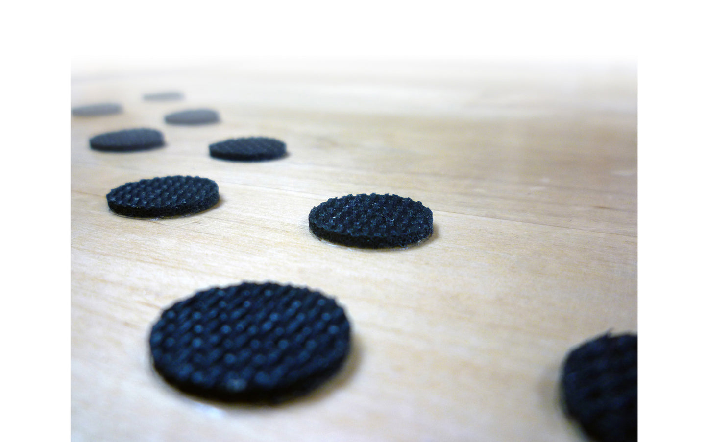 FastCap ~ Anti-skid peel & stick rubber traction dots - 1/2" diameter - 1/8" thick - Flexible rubber has tiny treads on the surface - Helps protect surfaces - Waterproof - can be applied to anything & not damage delicate surfaces. Rubber is flexible with tiny treads on surface for superior grip on smoothest materials - Made in USA