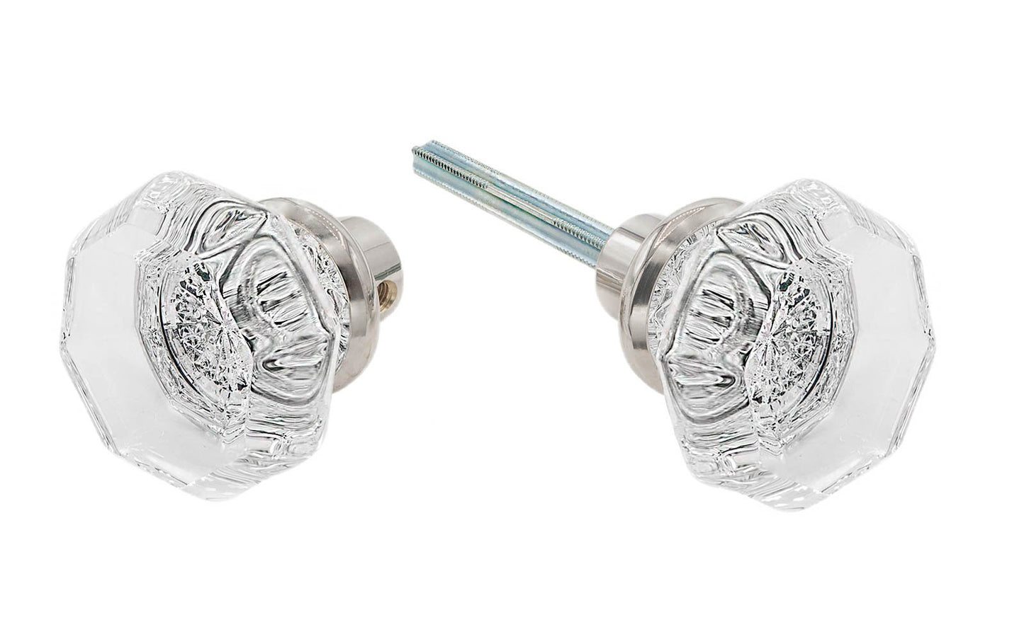 A high quality & genuine glass doorknob set with an attractive octagonal design. The sparkling center point under the glass amplifies reflected light to showcase beautiful facets. The rim of the brass base folds over the base of the glass knob for a secure grip. Polished Nickel Finish