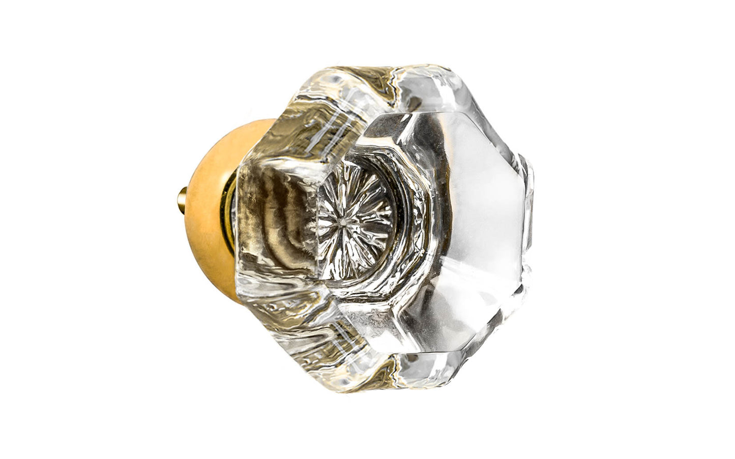 Elegant & classic octagonal cabinet glass knob with attractive genuine clear glass. The glass is carefully set into a handsome solid brass base with a threaded shank in the back. Unlacquered brass base - Will patina naturally over time. Octagon shape knob. 1-1/4" Diameter Knob 