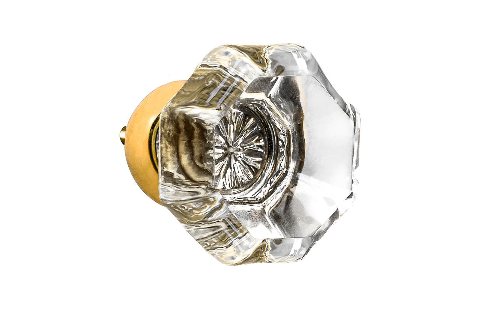 Elegant & classic octagonal cabinet glass knob with attractive genuine clear glass. The glass is carefully set into a handsome solid brass base with a threaded shank in the back. Unlacquered brass base - Will patina naturally over time. Octagon shape knob. 1-1/4" Diameter Knob 