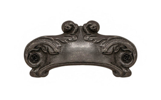 Rustic-looking & ornate cast iron bin pull with a nice scroll pattern detail. Made of cast iron material, this bin pull is thick with a good grip. This old-style bin pull is great for adding charm to your cabinets & drawers. Vintage-style finish with lacquer to resist rust. Scroll Pattern Bin Pull ~ 3-1/8" on Centers