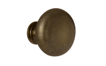 Vintage-style Hardware · Traditional & Classic 1-1/2" Diameter Brass Knob with an Antique Brass Finish. Made of high quality brass, this stylish round cabinet knob has a smooth look & feel on a pedestal shaped base. Works great in kitchens, bathrooms, on furniture, cabinets, drawers. Authentic reproduction hardware.