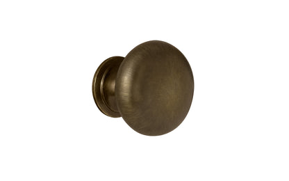 Vintage-style Hardware · Traditional & Classic 1" Diameter Brass Knob with an Antique Brass Finish. Made of high quality brass, this stylish round cabinet knob has a smooth look & feel on a pedestal shaped base. Works great in kitchens, bathrooms, on furniture, cabinets, drawers. Authentic reproduction hardware.