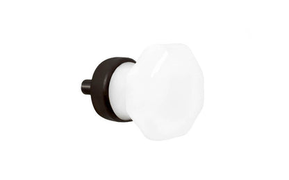 Elegant & classic octagonal cabinet glass knob with an attractive "Translucent White Opal" color. The glass is carefully set into a handsome solid brass base with a threaded shank in the back. Oil Rubbed Bronze finish on solid brass material. Octagon shape knob. 1" Diameter Knob 