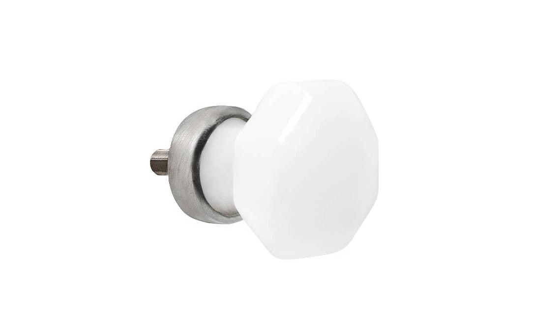 Elegant & classic octagonal cabinet glass knob with an attractive "Translucent White Opal" color. The glass is carefully set into a handsome solid brass base with a threaded shank in the back. Brushed nickel finish on solid brass material. Octagon shape knob. 1" Diameter Knob 