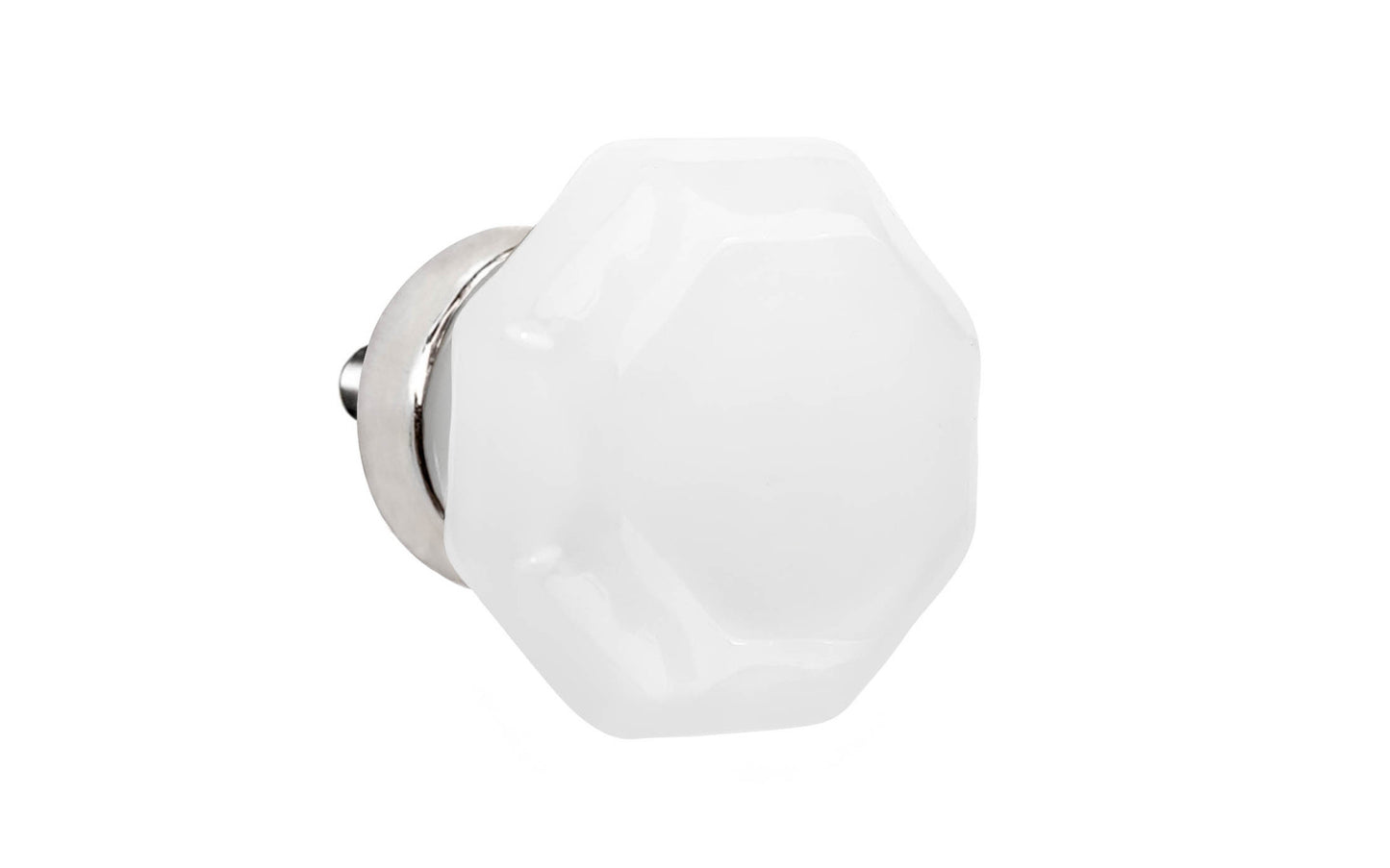 Elegant & classic octagonal cabinet glass knob with an attractive "Translucent White Opal" color. The glass is carefully set into a handsome solid brass base with a threaded shank in the back. Polished nickel finish on solid brass material. Octagon shape knob. 1-1/4" diameter knob.